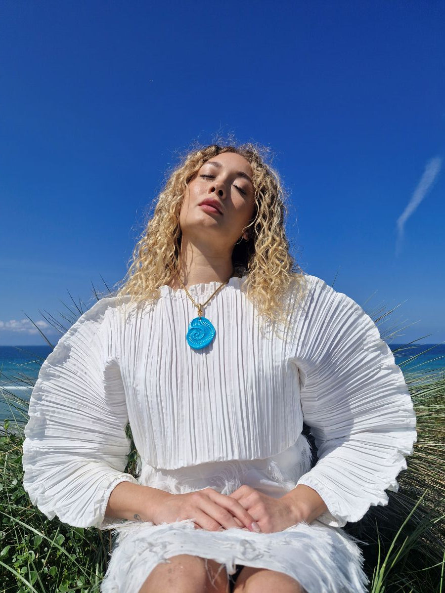 'Schiaparelli and the Sea' Shark Eye Shell Pendant